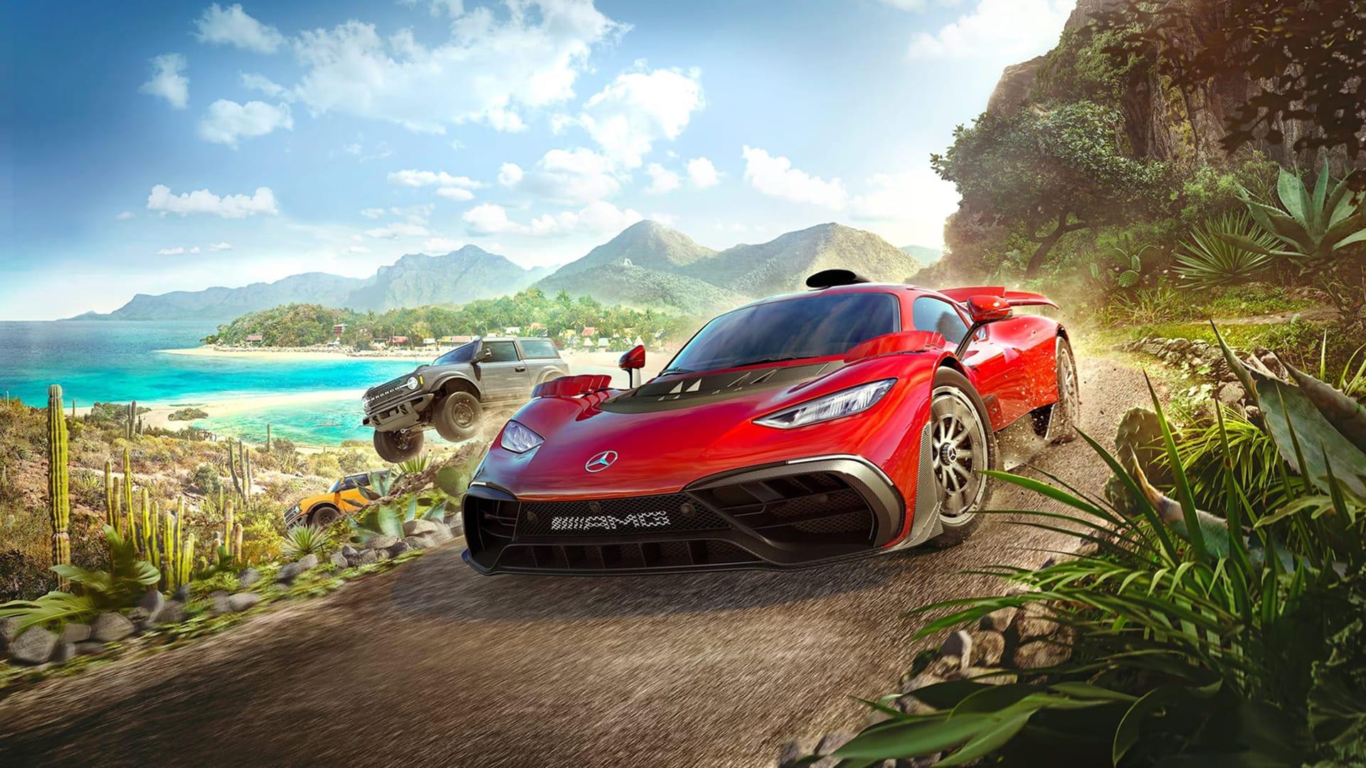 Article featured image showing red sports car on tropical mountain road, islands in the background
